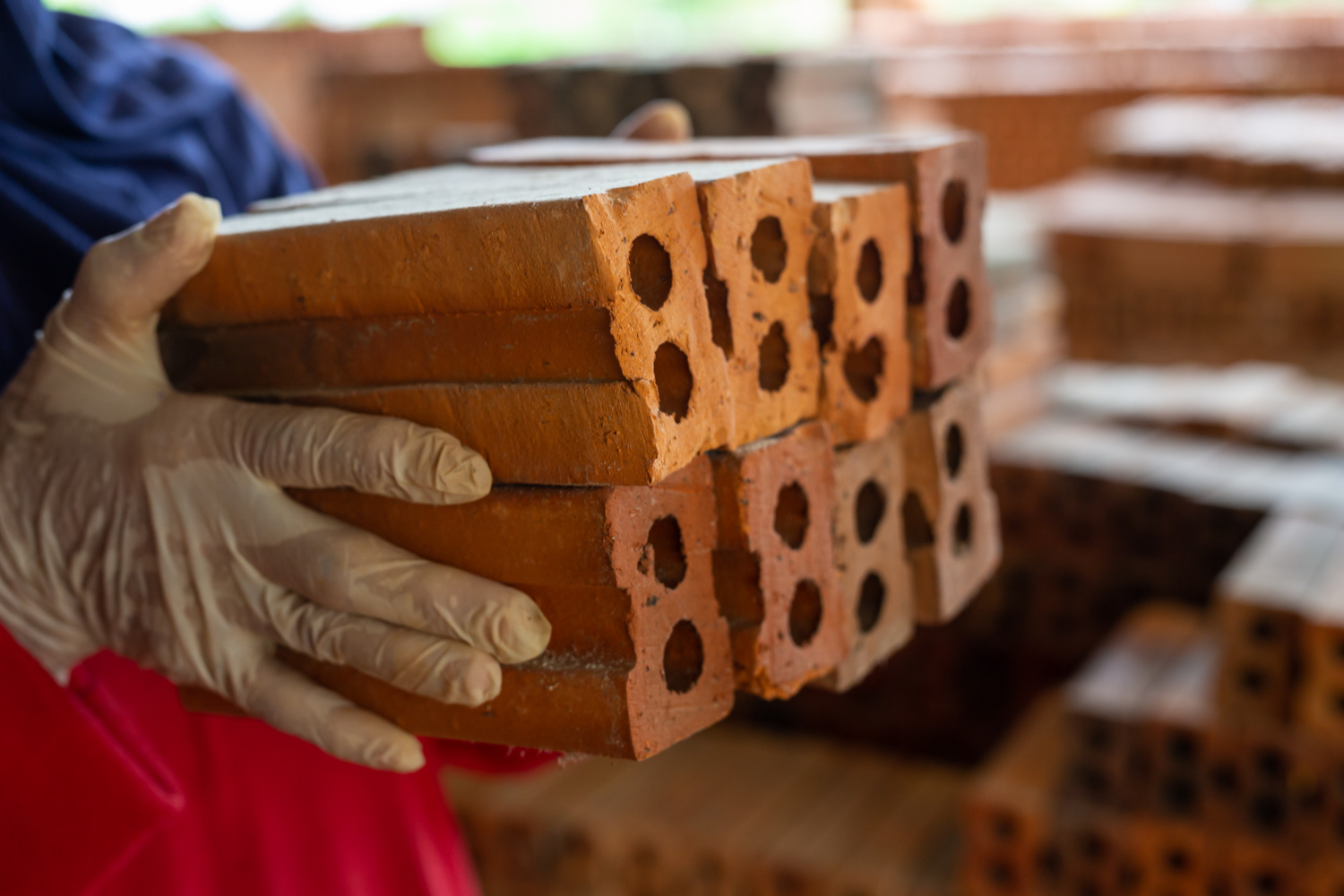 brick piles placed factory floor